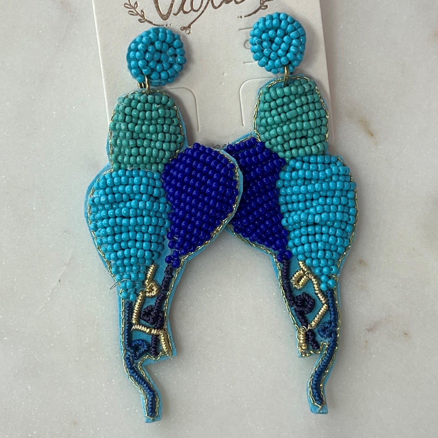 beaded balloon earrings in blue, turquoise and green